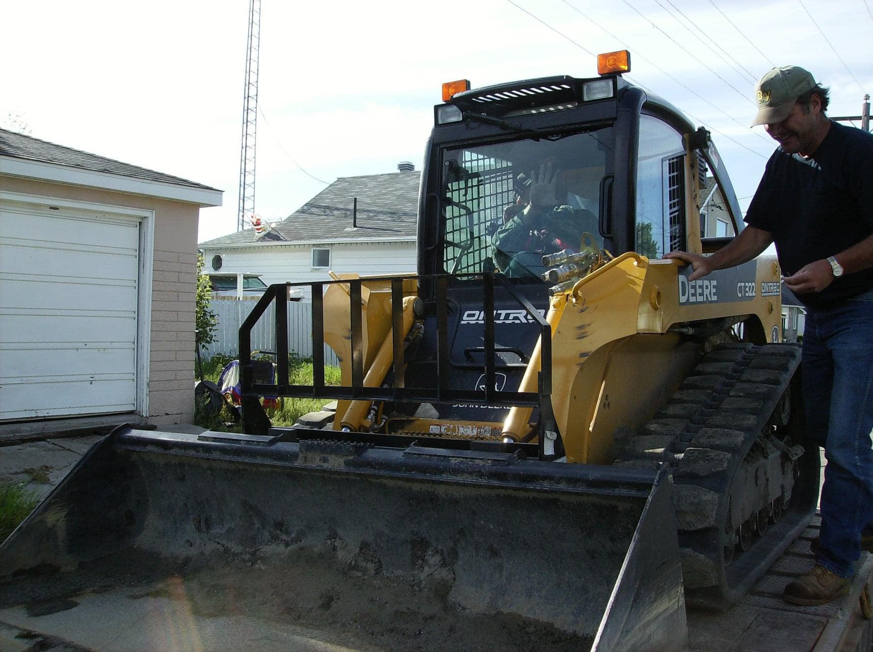 Completed landscaping project with retaining wall and plantings